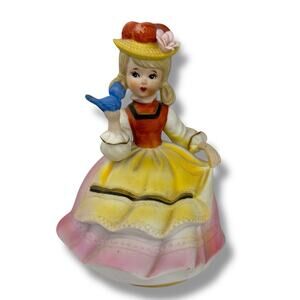 Vintage Porcelain German Girl w/Bird Music Box Rotating Plays "Edelweiss"